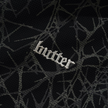 Butter Goods Thorn Camo Waffle Zip Hood nera dettaglio grafica camo